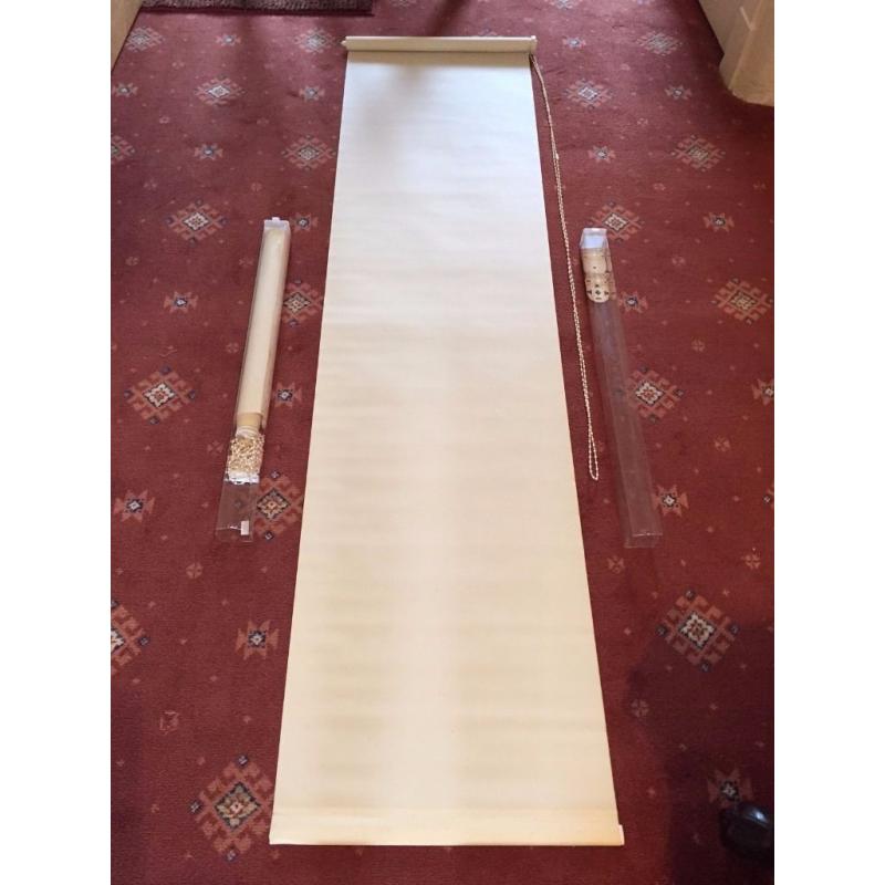 2 Cream corded roller blinds with metal rollers