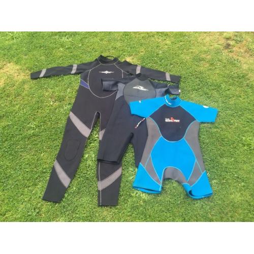 3 WetSuits. 2 XXXL Black and grey. 1 MEDIUM Blue Black and Grey