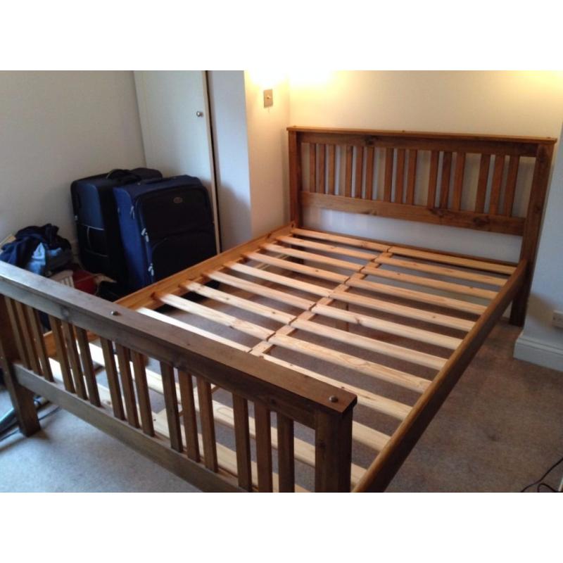Great condition real wood bed with mattress.