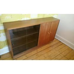 Wooden sideboard with sliding glass doors
