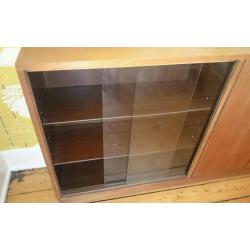 Wooden sideboard with sliding glass doors