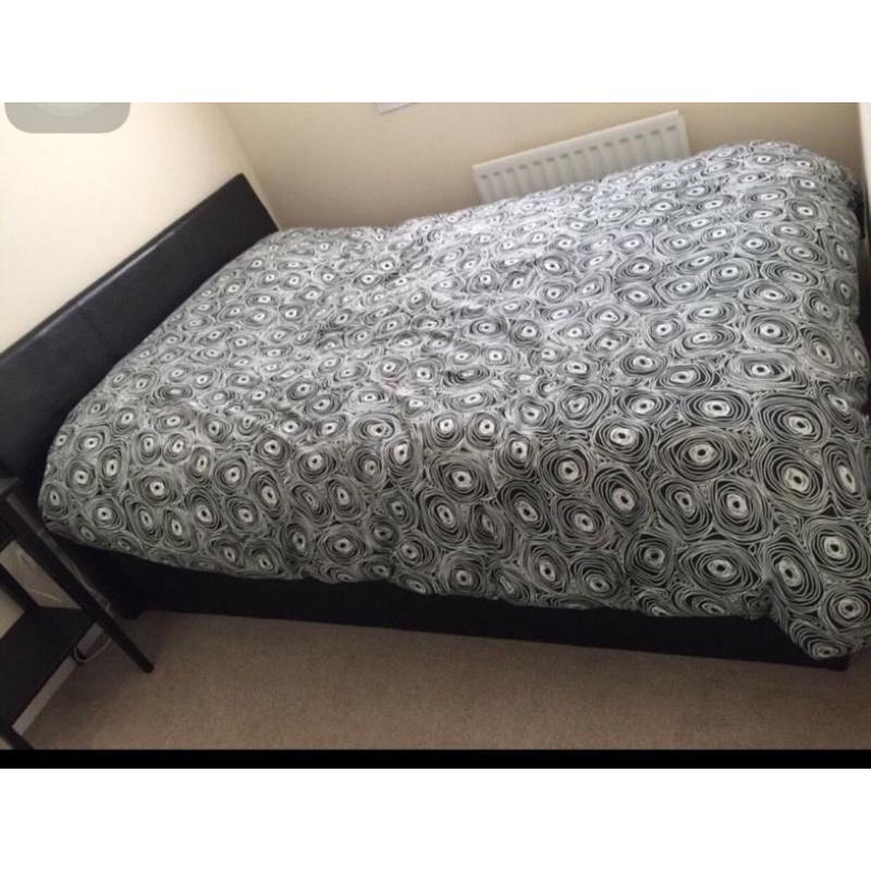 Black side lifted double bed