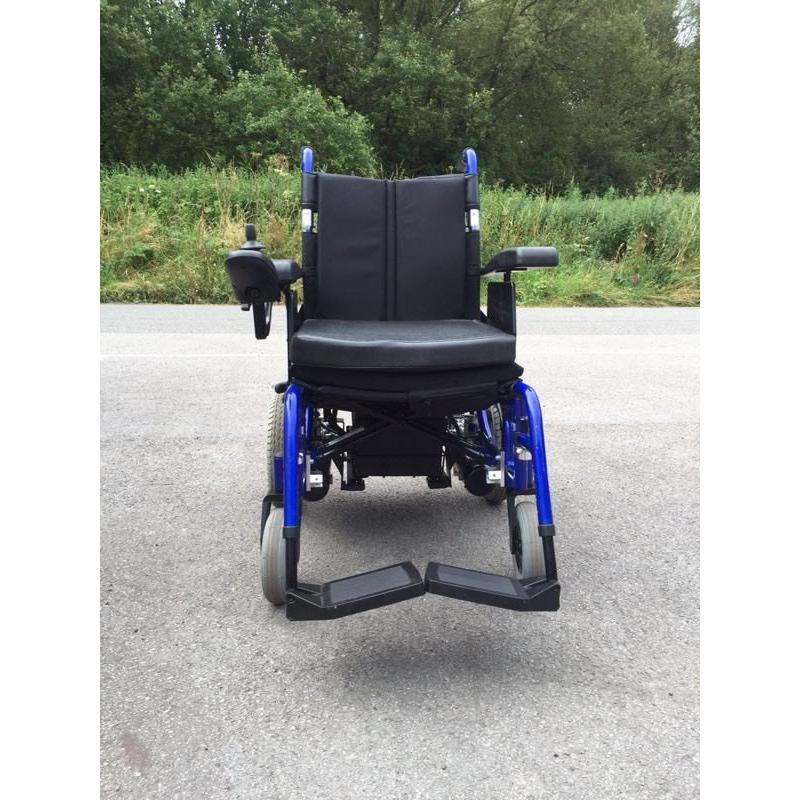 Used enigma electric wheelchair 18" seat