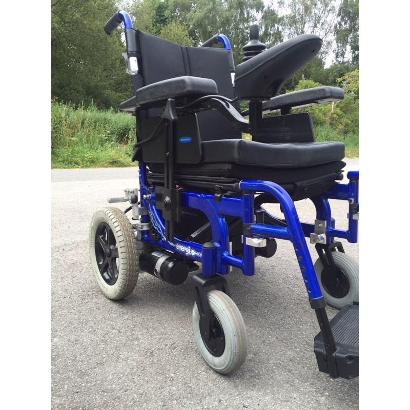 Used enigma electric wheelchair 18" seat