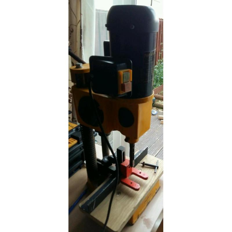 Morticer machine