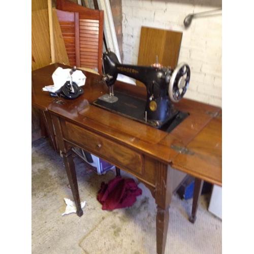 Original Singer sewing machine in the original table