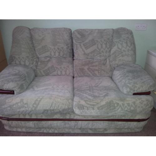very comfortable two seater sofa light green