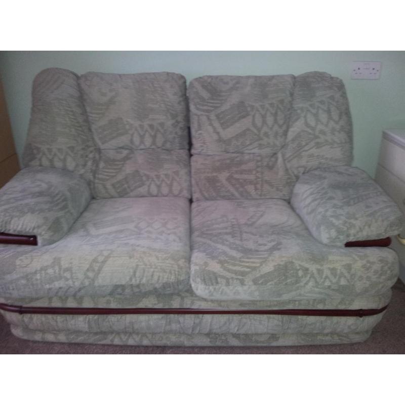 very comfortable two seater sofa light green