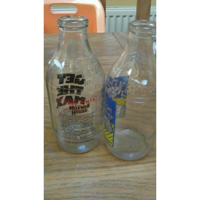2 decretive milk bottles