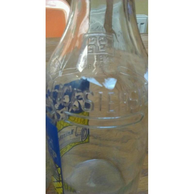 2 decretive milk bottles