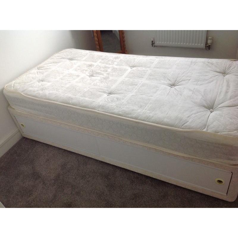 Single divan bed with slide drawres