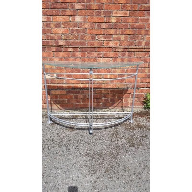 Smoked glass and chrome occasional table. Can be used in hall or lounge. Very stylish, from Heals.