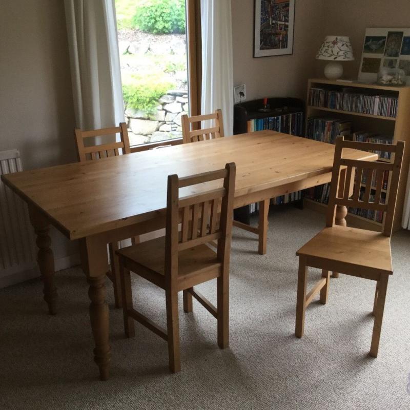 Pine dining table with 4 wooden chairs - seats 6/8