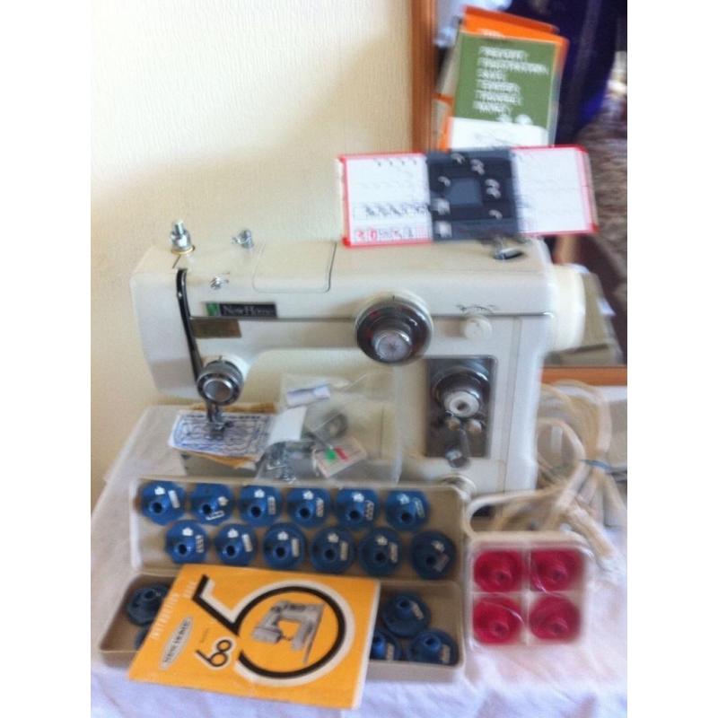 New home sewing machine with patterns!