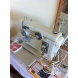 New home sewing machine with patterns!