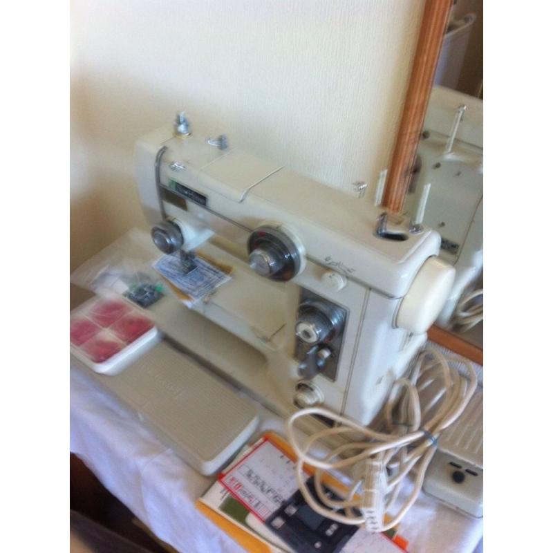 New home sewing machine with patterns!