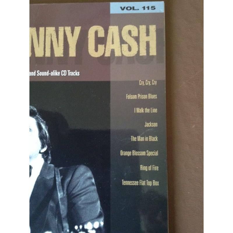 Guitarist books with cd play along Johnny cash