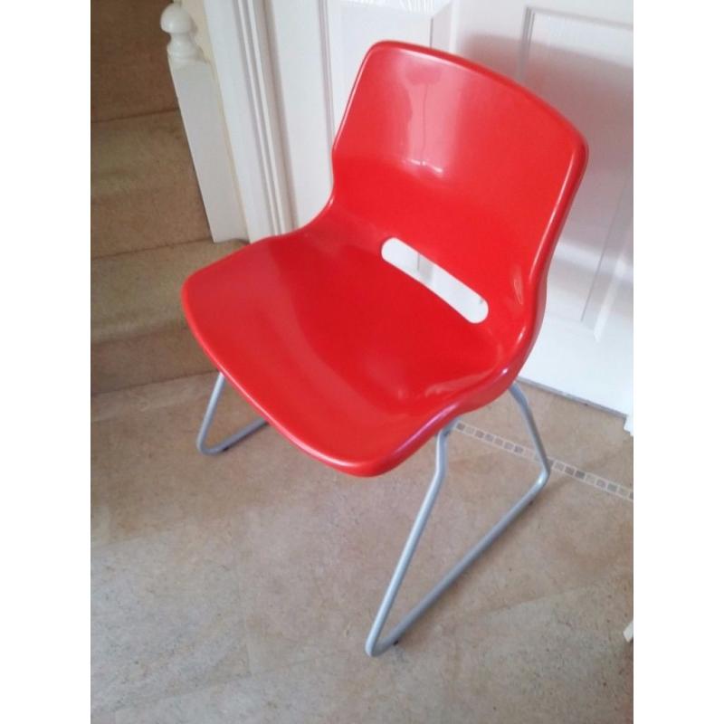 IKEA red plastic desk chair