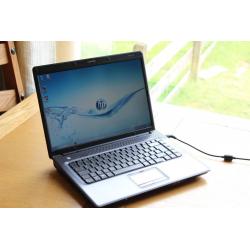 SUPERB HP WIDESCREEN 15.4" WINDOWS 7 INTEL DUAL CORE LAPTOP OFFICE 2007 PRO WITH GENUINE HP CHARGER