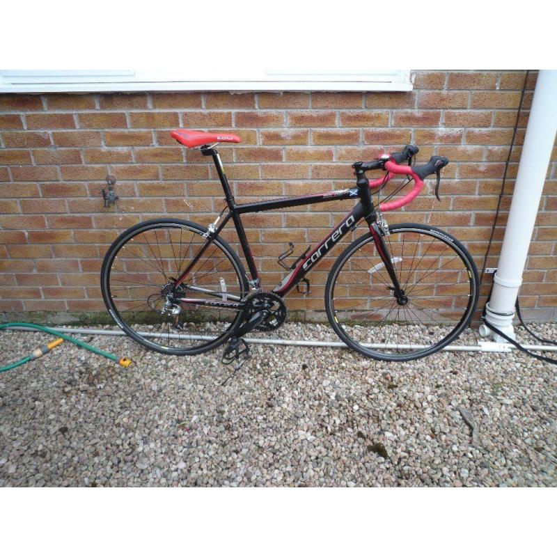 Carrera Zelos road racing bike from Halfords, size medium.