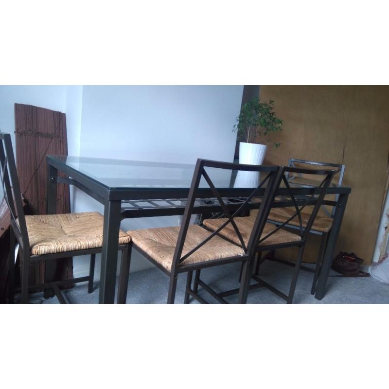 Black metal and glass table and 4 chairs