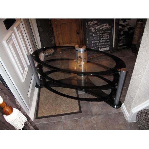 black and glass oval tv table