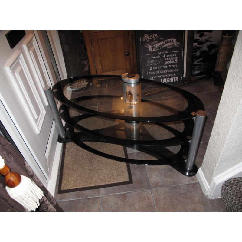 black and glass oval tv table