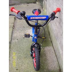 Boy's 14" blue bicycle with stabilisers