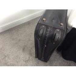 Black suitcase with wheels, 71cm wide x 46cm high