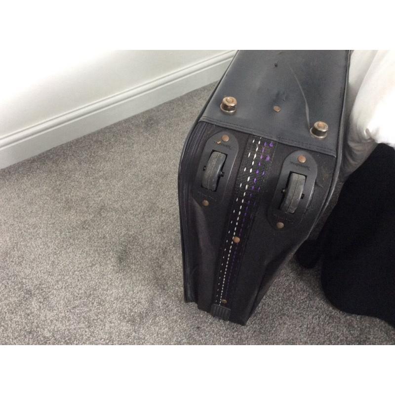 Black suitcase with wheels, 71cm wide x 46cm high