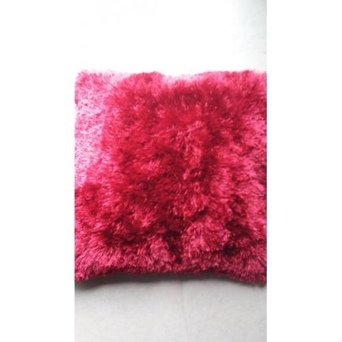 Shaggy rug and cushions