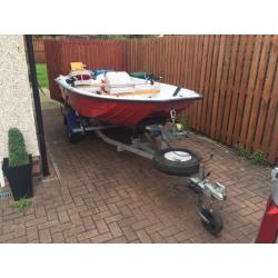 13ft dory with trailer and 9.9 evinrude 2 stroke engine
