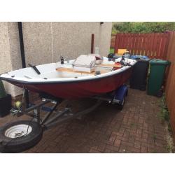 13ft dory with trailer and 9.9 evinrude 2 stroke engine