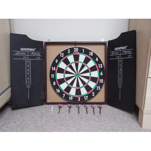 Winmau Dart Board in wooden Cabinet complete with two sets of darts.