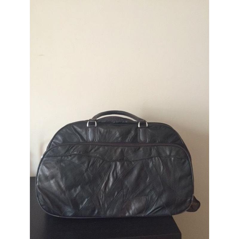 Leather bag with wheels