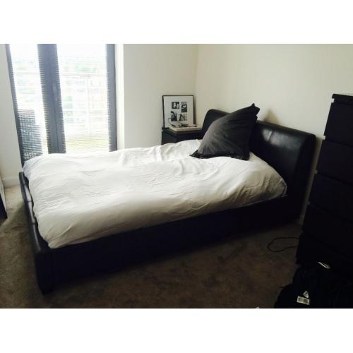 Double Bed. Brown Leather frame, including head board and mattress.