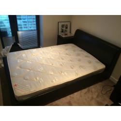 Double Bed. Brown Leather frame, including head board and mattress.