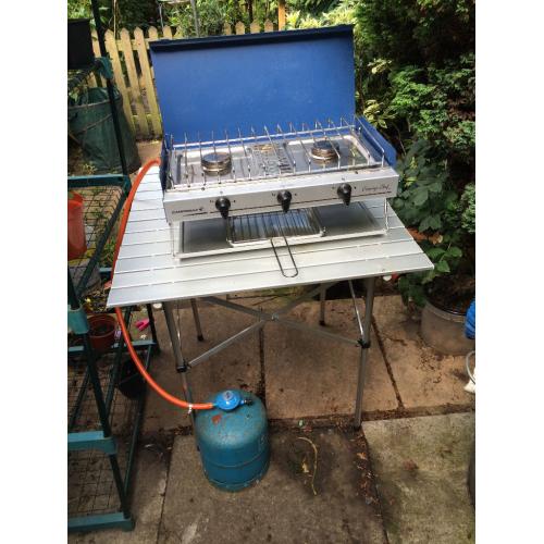 Table, cooker, regulator, gas bottle, gas and pipe