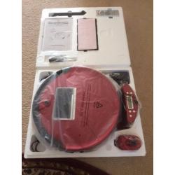 Red Robot vacuum cleaner with remote control