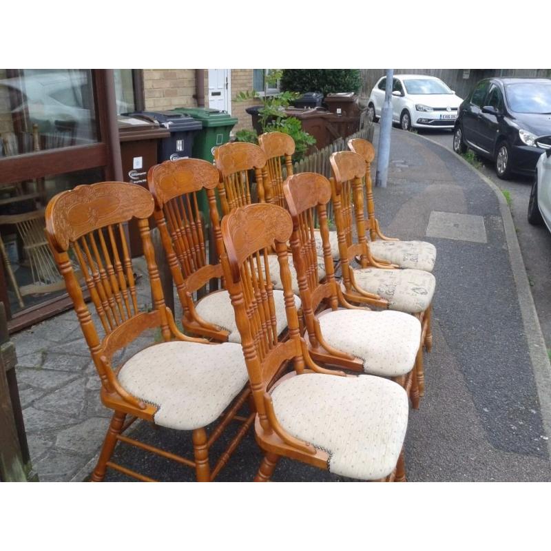 8 dining chairs,solid oak,carved back,clean cushion