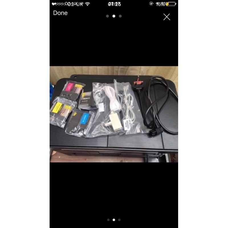 Brother MCF-J625DW A3 printer, with ink cartridges, connectors and more.