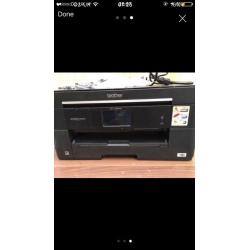 Brother MCF-J625DW A3 printer, with ink cartridges, connectors and more.