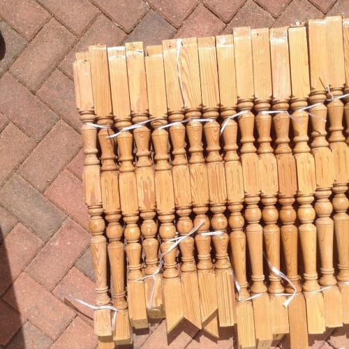 Set of 44 used Red Pine Stair Spindles with 2 Acorn shape newel tops