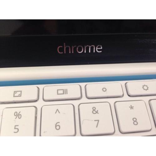 White chrome Hp laptop