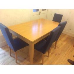 Dining table and 4 navy high back chairs