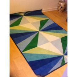 Vibrant coloured rug. - size 4'4" X 6' 5"