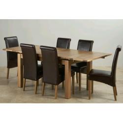Oak dining table and chairs