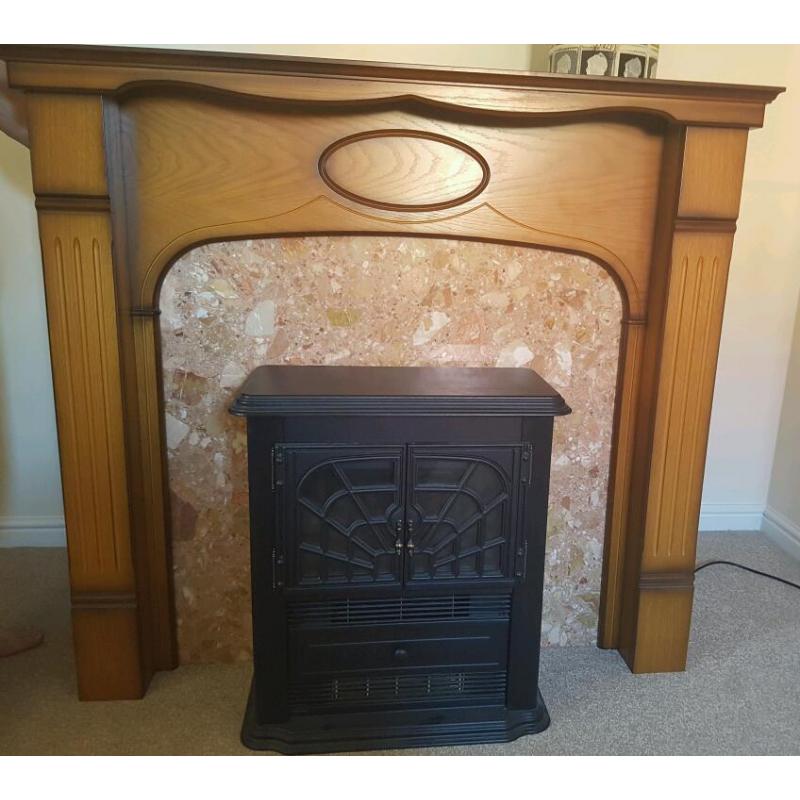 Fire Place with marbel surround and dimplex electric fire.