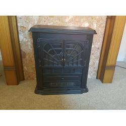 Fire Place with marbel surround and dimplex electric fire.