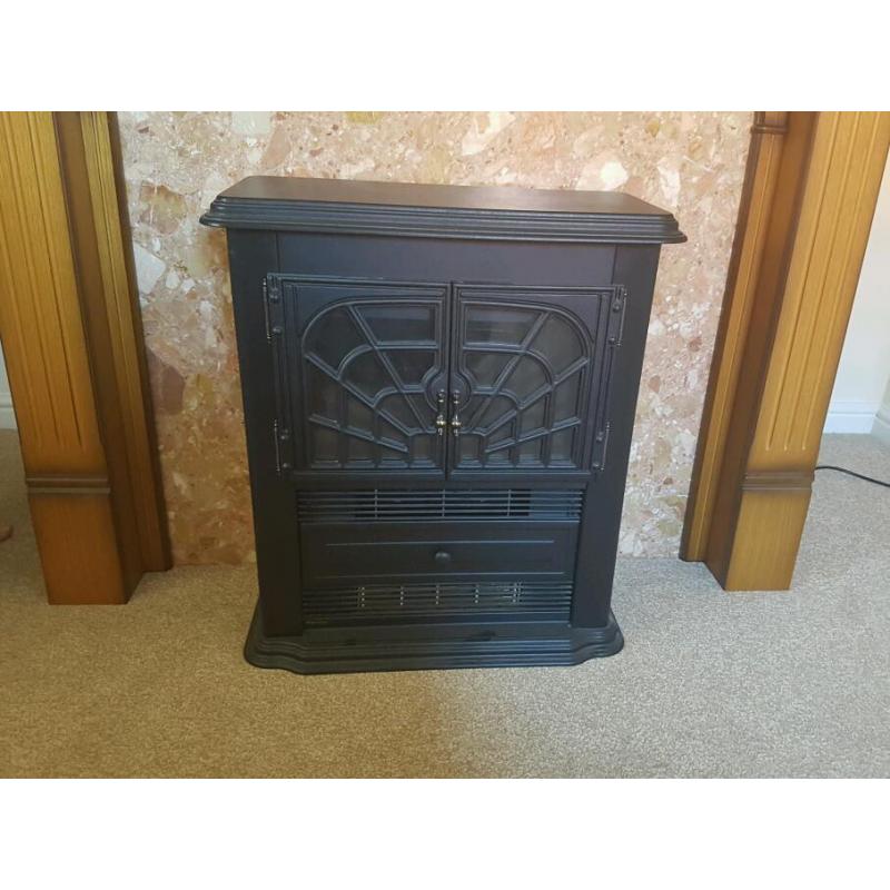 Fire Place with marbel surround and dimplex electric fire.